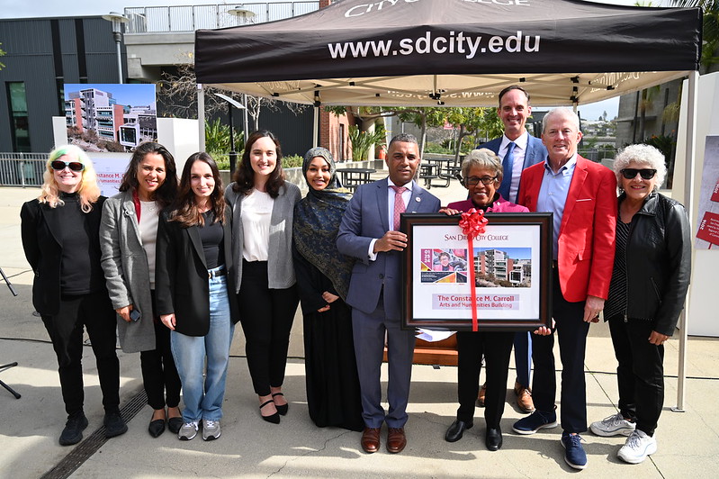 Group photo with Chancellor Emerita Carroll, City College President Shabazz, district and campus leaders, and students.