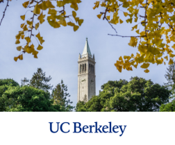 UC Berkeley Campanile clock tower viewed through trees.