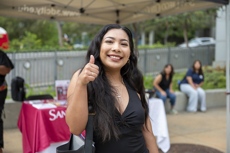 San Diego City College students with you belong signs